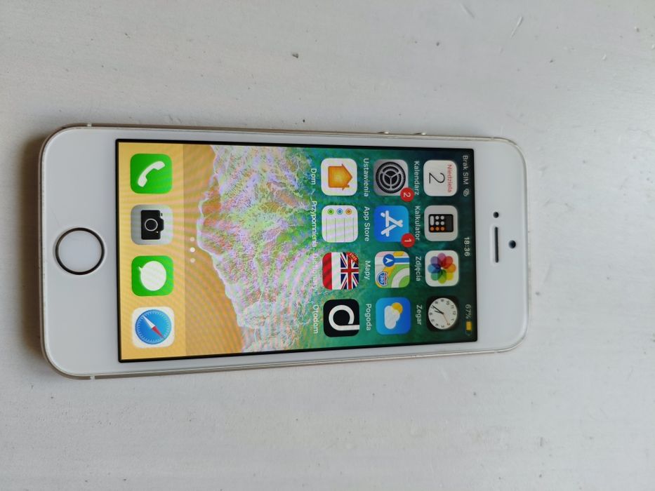 iPhone 5s 16GB złoty + kabel i słuchawki