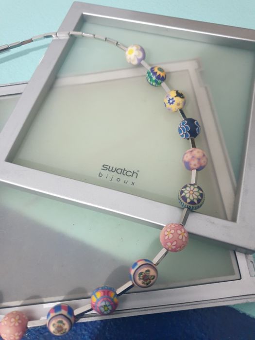 Colar com contas trabalhadas