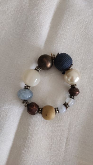 Pulseira  bolas azul e castanho