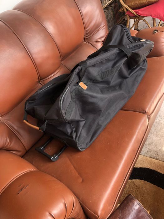 Trailer com rodas ou saco viagem mala