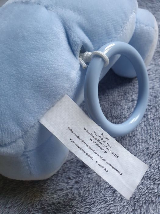 Pozytywka Tulilo miś kotek błękitny z grzechotką jak nowa 22cm