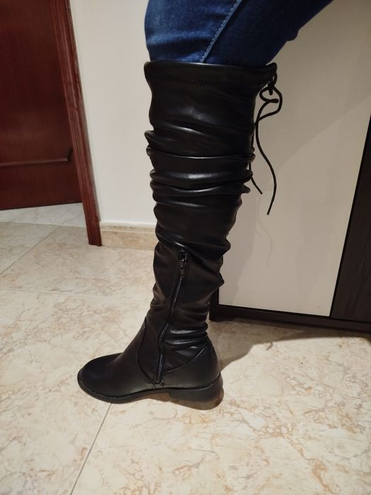 Bota cano alto   .