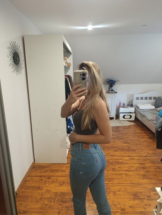 Spodnie  przetarcia Levi's 720 high rose super skinny bawełna 27 wysok
