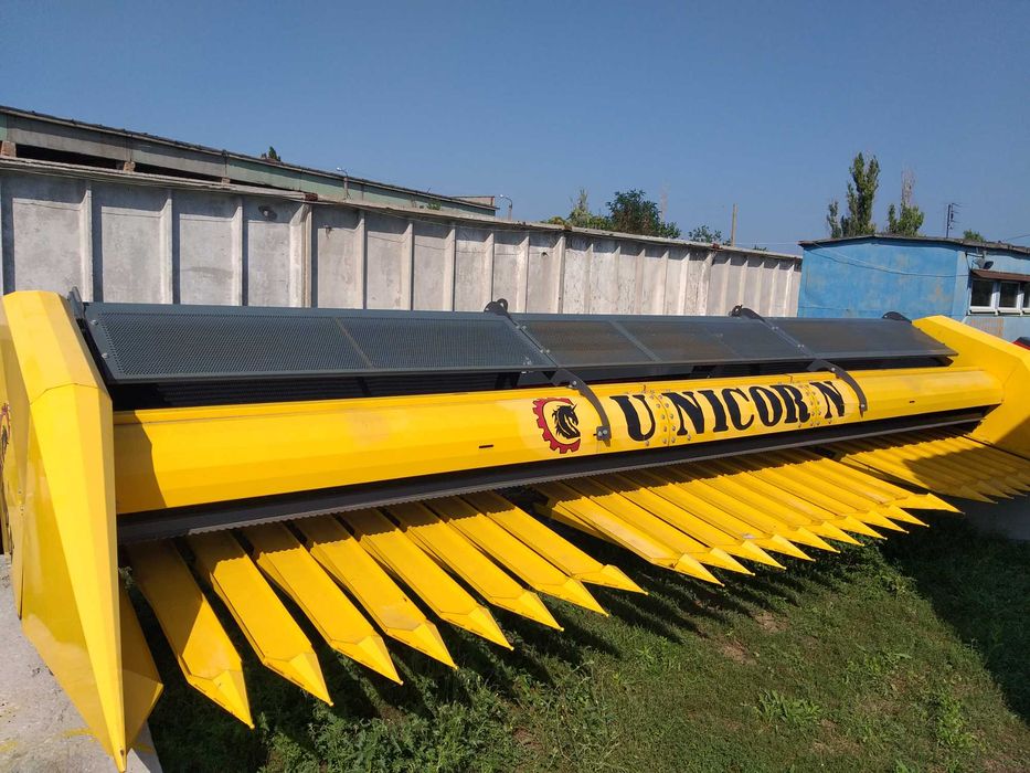 Жатка соняшникова UNICORN від ВИРОБНИКА під комбайн New Holland, Нью-Холланд/ Caterpillar, Катерпіллер / Challenger, Челленджер від 6 до 12 метрів
