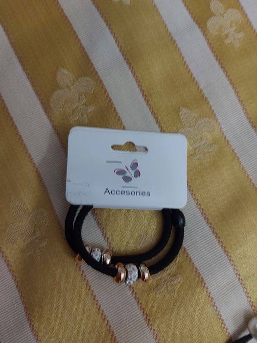 Conjunto mala e elásticos.