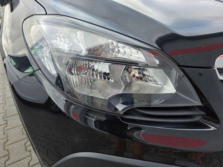 OPEL MOKKA 12-16 LAMPA PRAWA PRZEDNIA CIEMNA CIEMNY ŚRODEK WERSJA ANGIELSKA