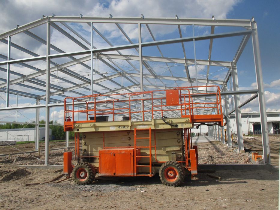 podnośnik nożycowy zwyżka koszowy 15 - 18m wynajem jlg genie haulotte