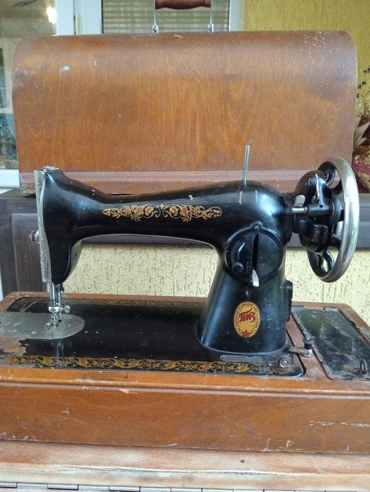 Швейна машинка Подолка