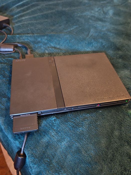 PS2 Slim + jogos + 2 comandos