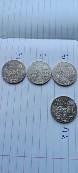 Монети України .