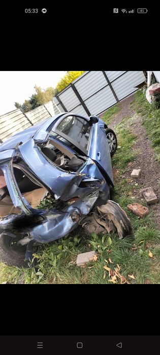 Нісан мікро 2003