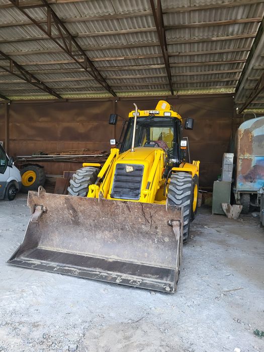 JCB-4CX екскаватор навантажувач