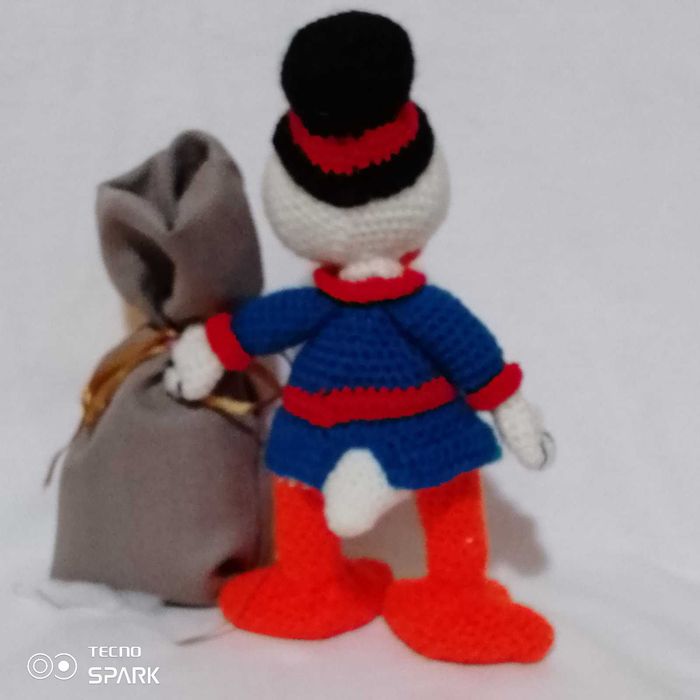 Скрудж Макдак- талісман богатства.