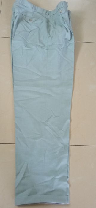 Umberto Rosetti letnie eleganckie spodnie męskie 30% wiskoza 88 cm pas