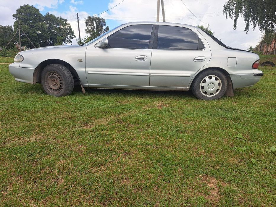 Ручки дверні kia  clarus