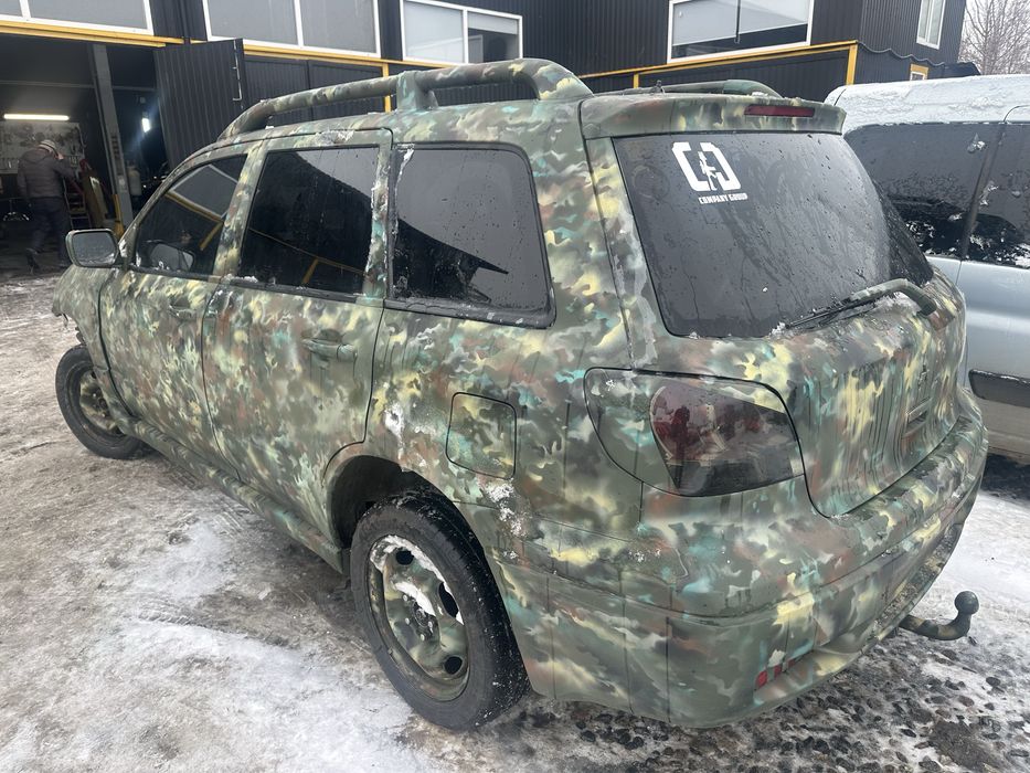Miitsubishi  outlander 2.4 повний привід