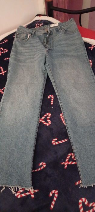 Calças de ganga a boca de sino