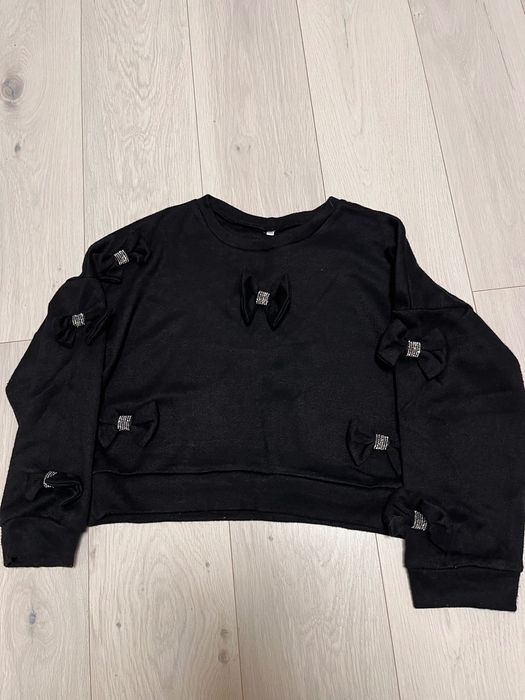 Кофточка на дівчинку з бантиками,152