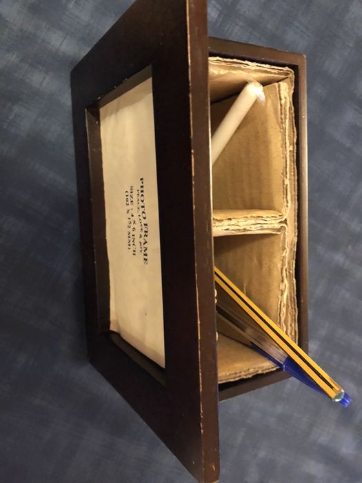 Moldura de madeira com arrumação