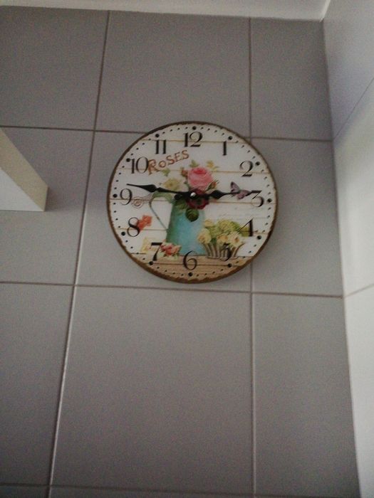 Relógio de parede em vidro