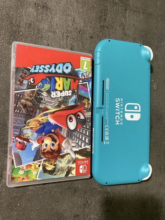 Nintendo Switch Lite 128 GB * stan jak nowy * oryginalna ladowarka *