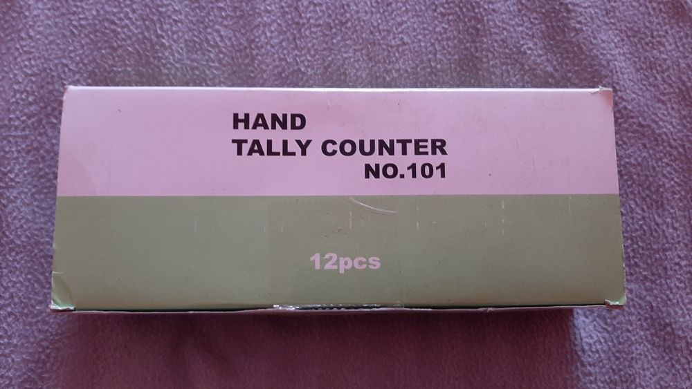 Contador de mão metálico