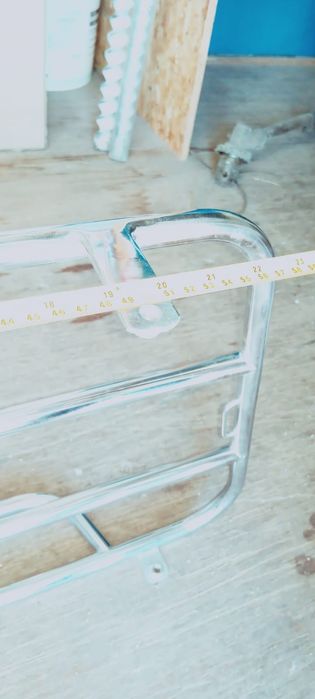 Suporte/grelha para mala