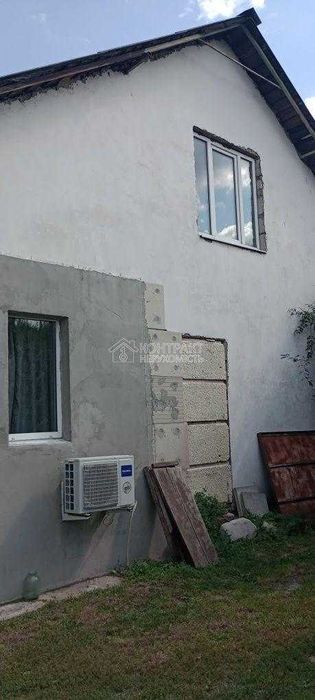 Будинок з  ділянкою  для  бізнесу біля озера та бору продаж