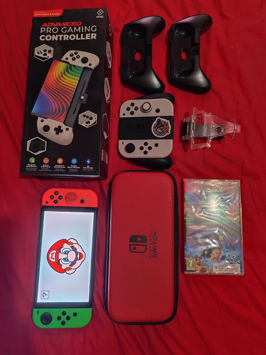 Nintendo Switch OLED + extras