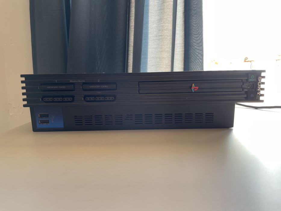 Ps2 com jogos e comando incluido64586016785154122