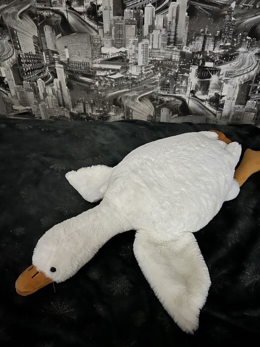 Игрушка гусь.