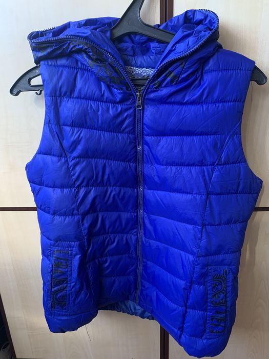 Жіноча жилетка 158-164