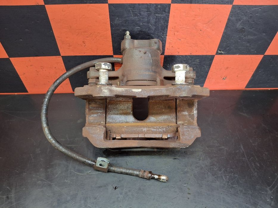 Pinça travão / maxila de travão trás esquerda MITSUBISHI TRUCKS Canter