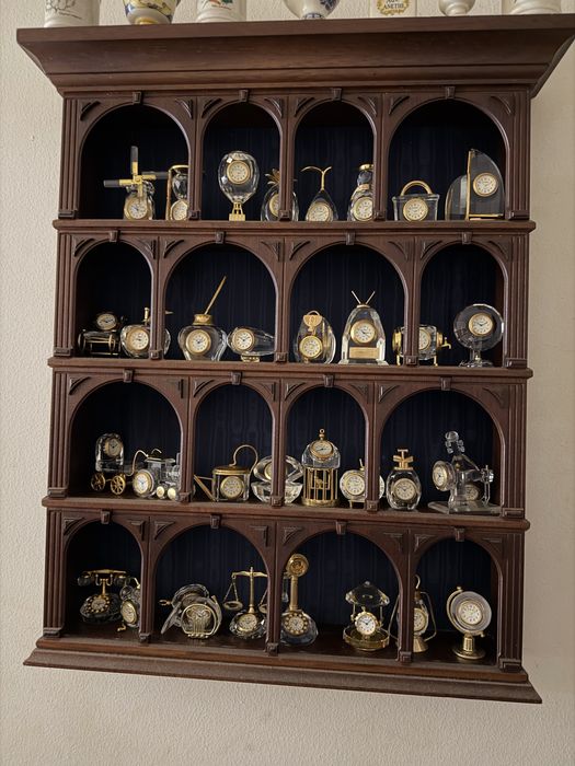 Colecao de relogios em cristal e ouro