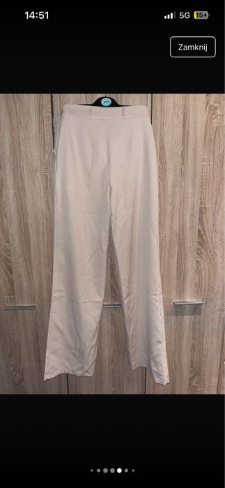 kremowe bezowe spodnie materialowe