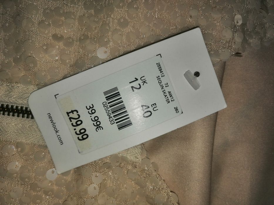 Nowa sukienka cekinowa rozmiar L ale to bardziej S