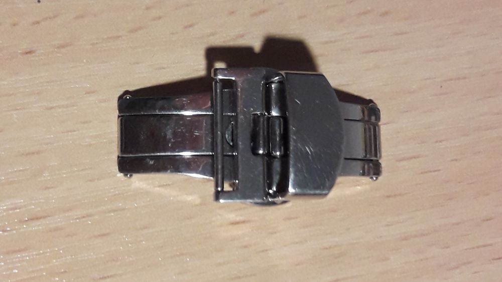 Пряжка метелик подвійна, бакля, кліпса.