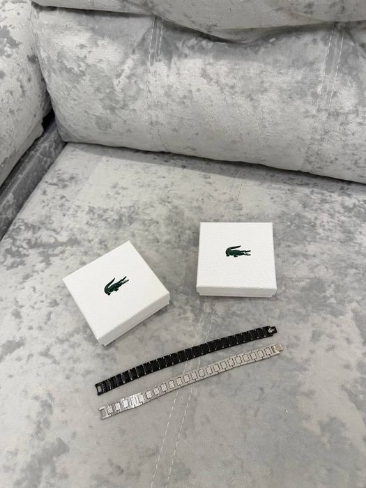 Браслет Lacoste унісекс чорний/срібний з гравіюванням