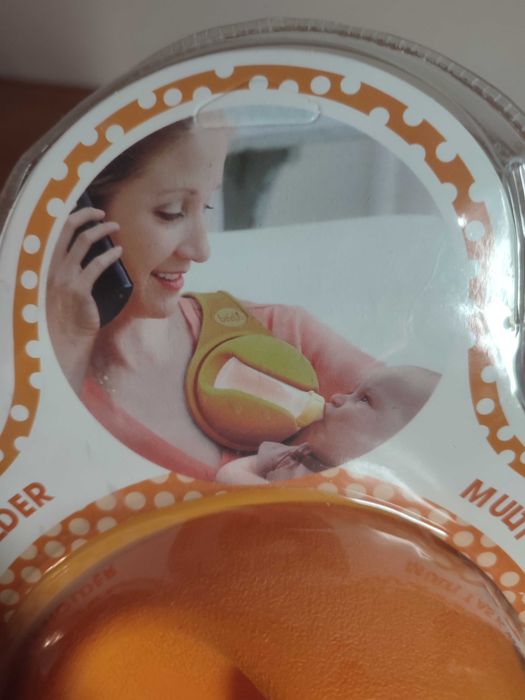 Uchwyt na butelkę do karmienia dziecka – Free Hand Bottle Holder