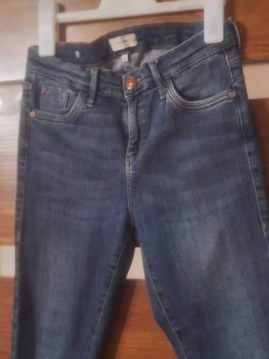 Spodnie damskie River Island rozm.8 stan bardzo dobry.