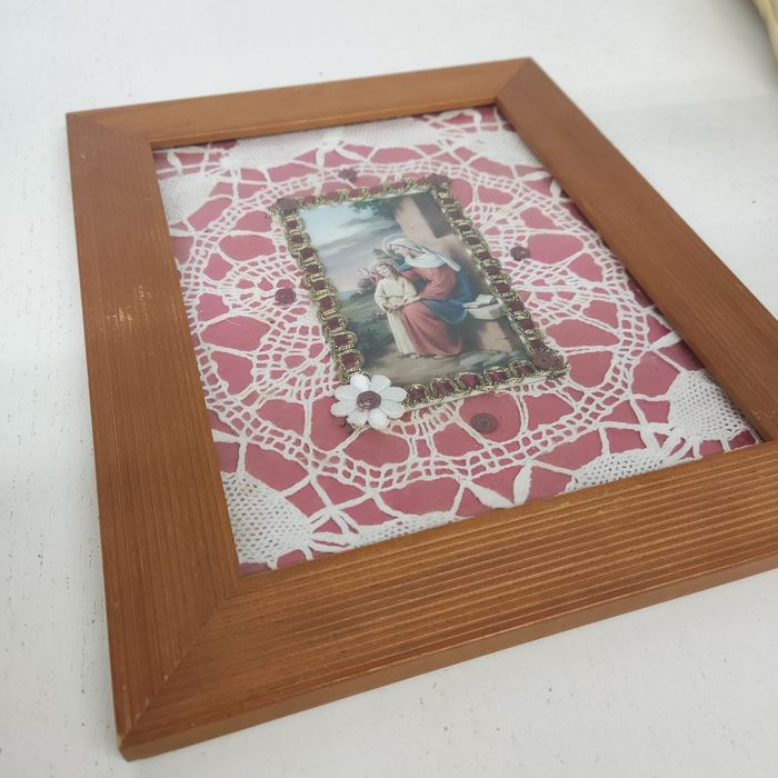 Quadro com registros antigos de São José 
bordas em mármore

Em excele