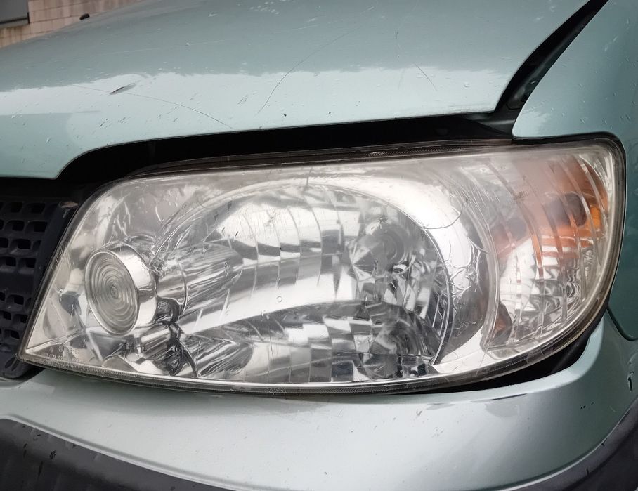 Ótica / farol esquerda HYUNDAI Matrix (FC)