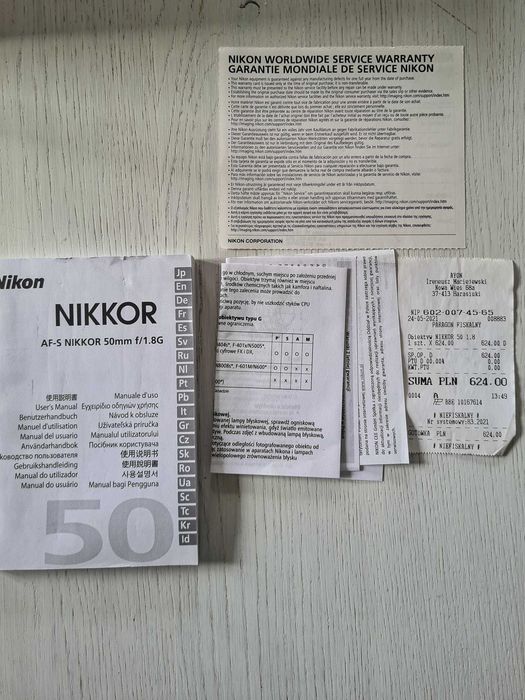 Obiektyw Nikon AF-S Nikkor 50mm f/1.8G – pudełko, dokumenty, 2 dekielki.