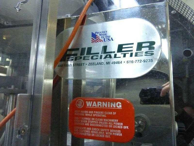 Filler Specialties GWFS 63R rotacyjna napełniarka , rozlewaczka PET