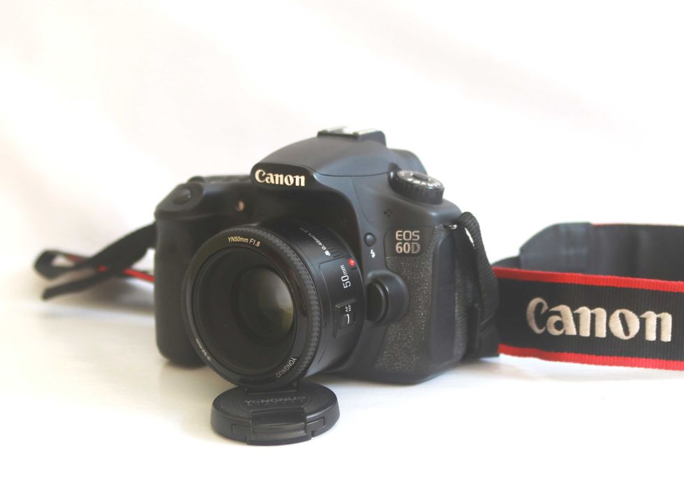 Canon 60D e lente Yongnuo 50 f\1.8 máquina fotográfica digital reflex