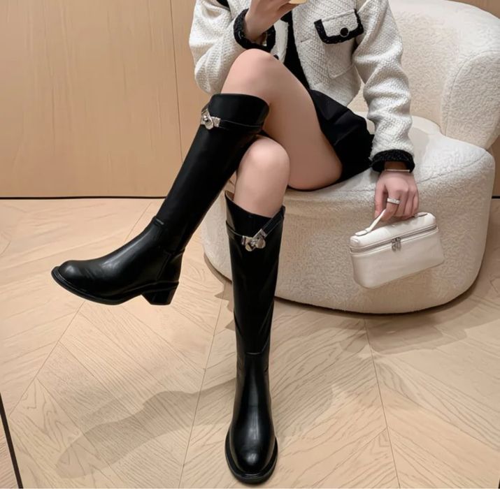 Продам сапоги нові