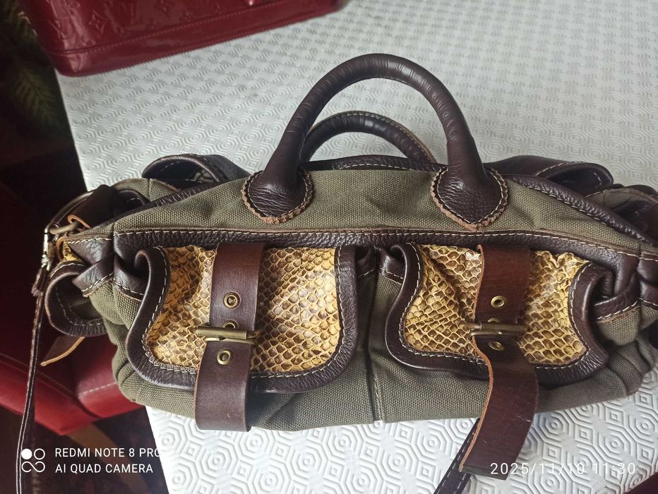 Mala de mão, marca "MUU", nova.