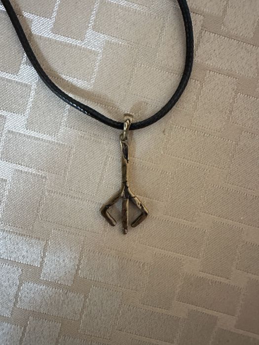 Новий латунний кулон