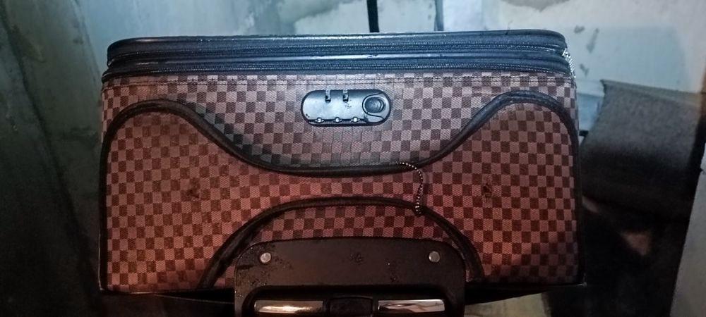 Великий дорожній чемодан тканинний з поліестеру на 4-х колесах