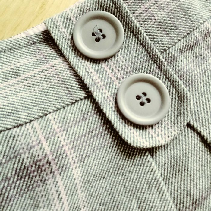 Plisowana spódnica w kratę z guzikami r. 9/10 lat